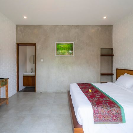 Utamas Keramas Hotel Buitenkant foto