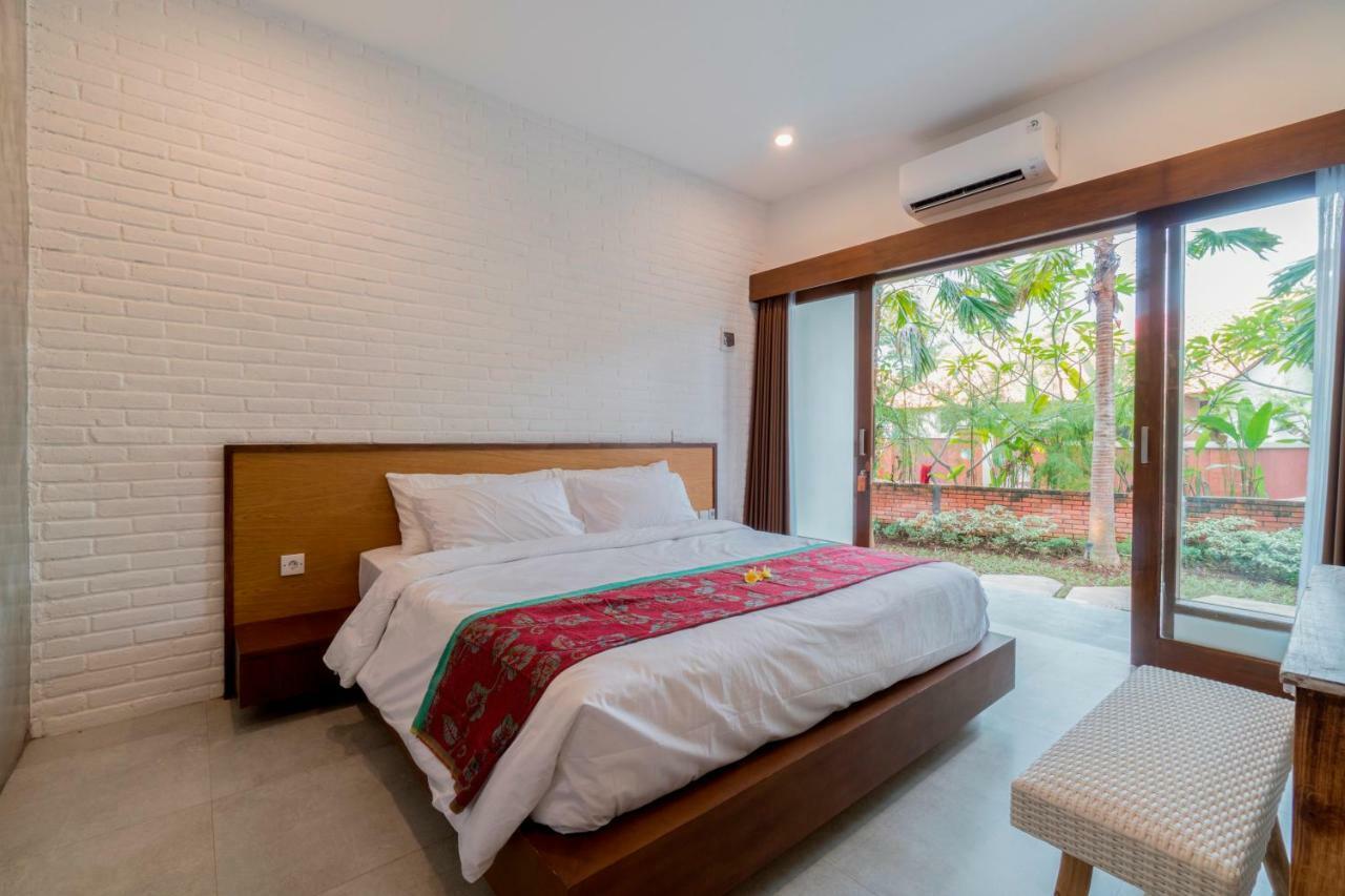 Utamas Keramas Hotel Buitenkant foto