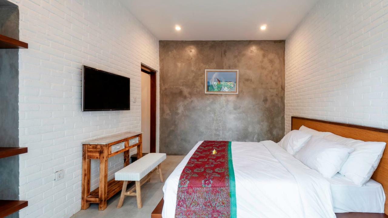 Utamas Keramas Hotel Buitenkant foto